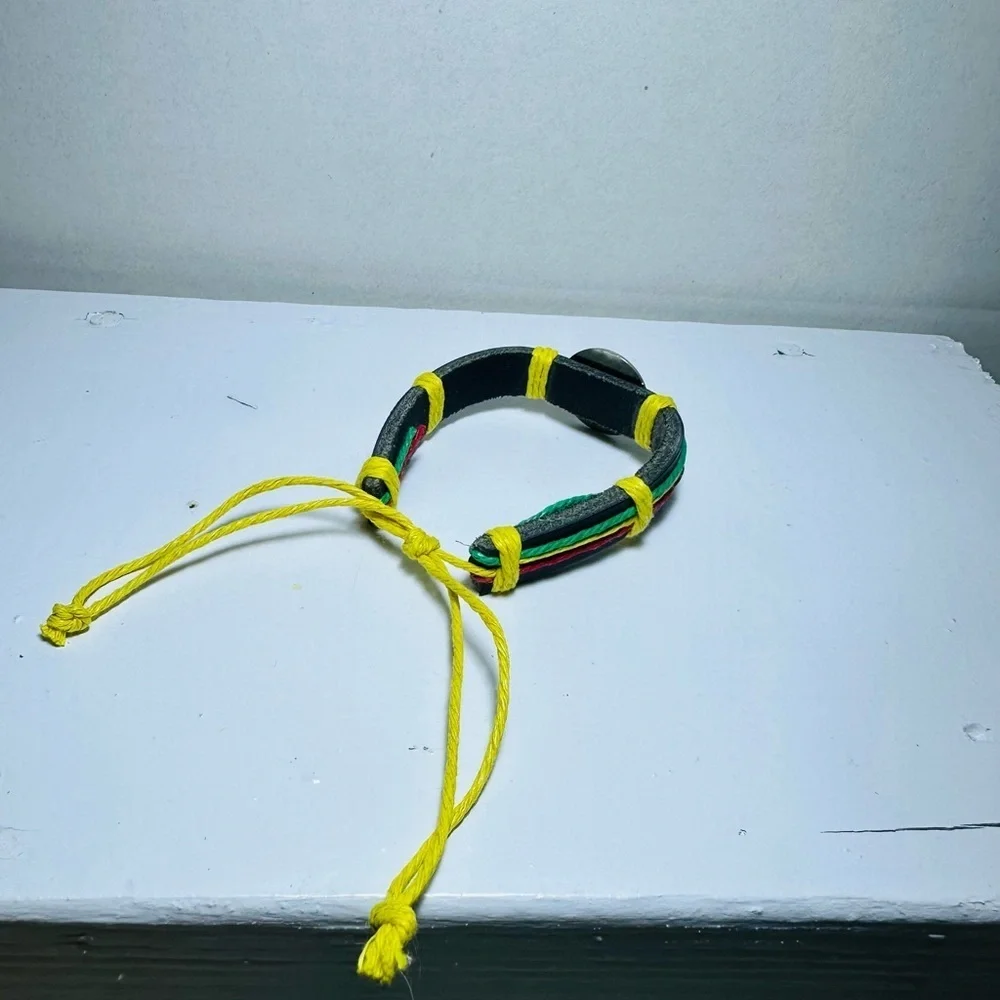 Handcrafted Rasta Bracelet with Leaf Emblem